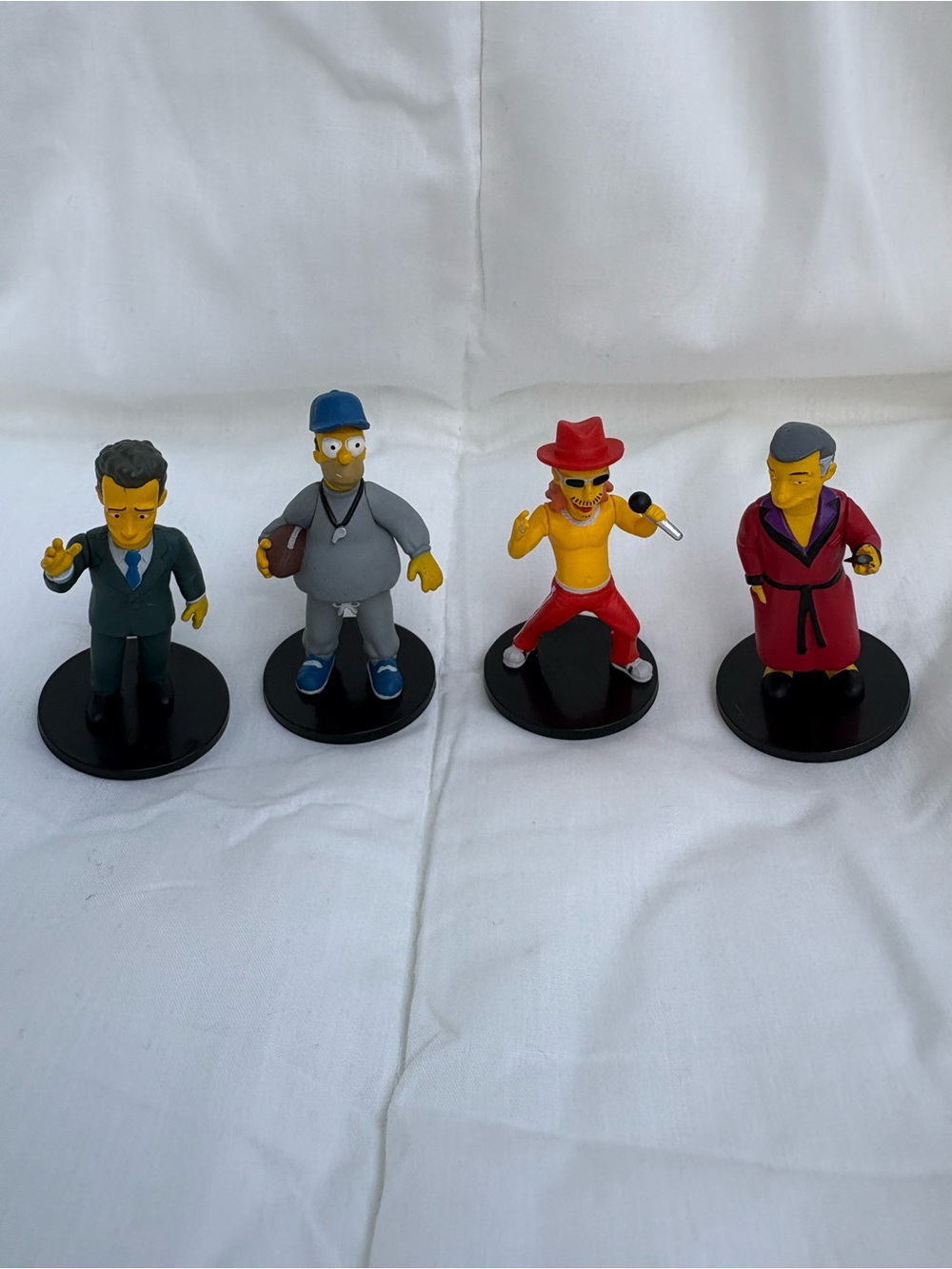 NECA The Simpson Tom Hank, Hugh Hefner, Kid Rock and Coach Homer Simpson.
